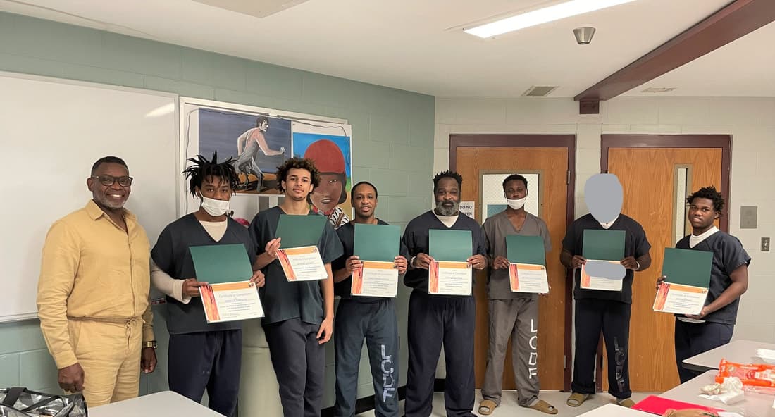 Participants in a DRMI men-focused group setting.