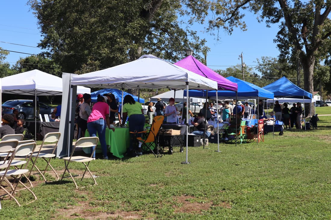 DRMI community event with local vendors and neighbors gathered outdoors